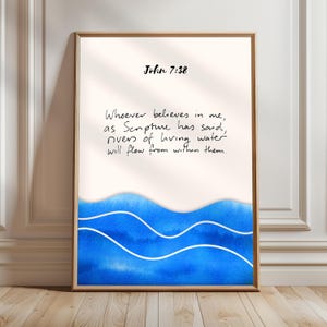 May include: A white background with blue watercolour waves at the bottom. The text "John 7:38" is at the top of the image. The text "Whoever believes in me, as Scripture has said, rivers of living water will flow from within them." is in black cursive handwriting.