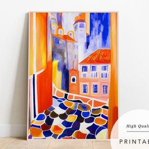 May include: A colourful abstract painting of a city street with buildings in shades of orange, yellow, blue, and pink. The street is paved with a mosaic of colourful tiles.