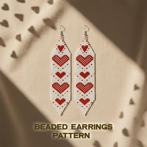 May include: White beaded earrings with a pattern of red hearts. The earrings have a rectangular shape with a triangular top and a silver hook. The text "BEADED EARRINGS PATTERN" is at the bottom of the image.