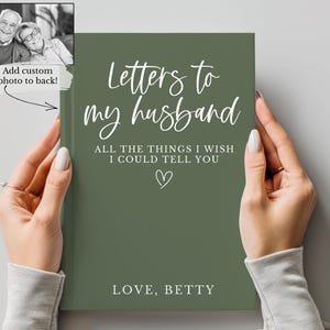 May include: A green journal with the title "Letters to my husband" in white script. The text "ALL THE THINGS I WISH I COULD TELL YOU" and "LOVE, BETTY" are also displayed. A small black and white photo is in the upper left corner.