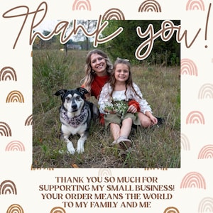May include: A woman and a young girl are sitting in a grassy field with a black and white dog. The woman is wearing a red shirt and the girl is wearing a white shirt with a floral pattern. The dog is wearing a bandana. The text "Thank you!" is written in brown cursive at the top of the image. The text "THANK YOU SO MUCH FOR SUPPORTING MY SMALL BUSINESS! YOUR ORDER MEANS THE WORLD TO MY FAMILY AND ME" is written in brown text at the bottom of the image.