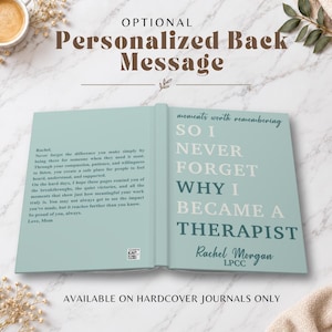 May include: A light blue hardcover journal featuring a personalized back message and a front cover with the text: moments worth remembering SO I NEVER FORGET WHY I BECAME A THERAPIST, followed by the name Rachel Morgan LPCC in dark blue script.