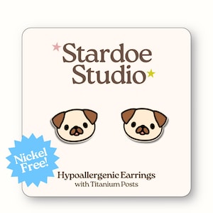 May include: A white card with the text "Stardoe Studio" and a star on either side. The card features a blue star with the text "Nickel Free!" and two cartoon pug earrings. The text "Hypoallergenic Earrings with Titanium Posts" is also on the card.