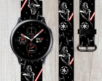 May include: A black smartwatch with a white face and red accents. The watch face displays the date, time, and a weather icon. The watch is on a black and white band with a Star Wars theme featuring Darth Vader and the Imperial logo.