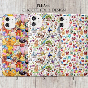 May include: Five different phone cases with various Disney character designs. Each case features a white background with colorful cartoon characters and icons. The designs include Mickey Mouse, Minnie Mouse, Cinderella, and other Disney characters.