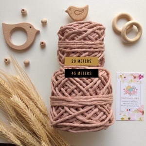 May include: Two spools of natural colored cotton rope, one 20 meters and one 45 meters long. The rope is perfect for macrame projects.