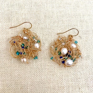 Round fresh water pearl and  bead earrings