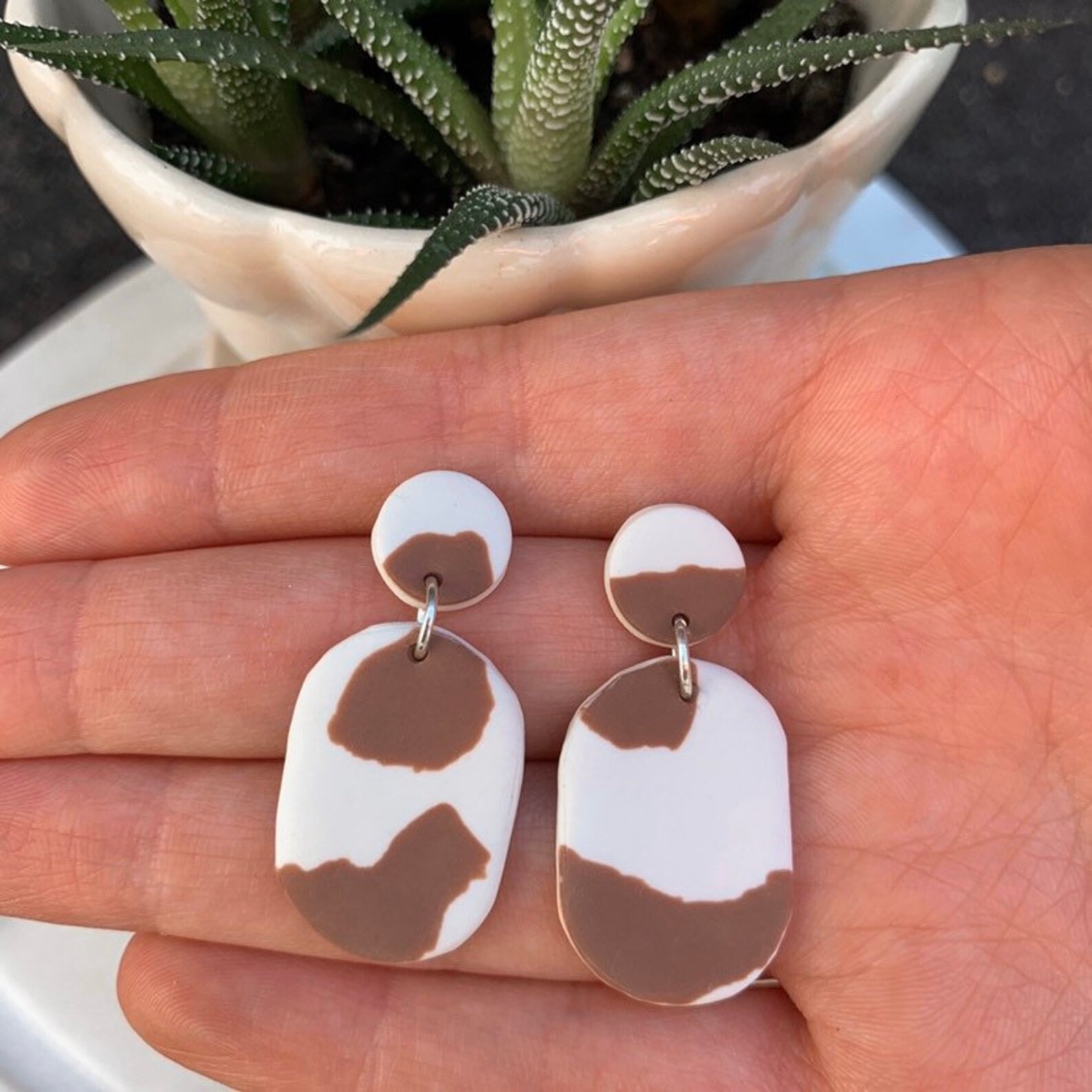 Cowhide print handmade earrings Etsy
