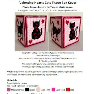 May include: A pink and black plastic canvas pattern for a Valentine's Day tissue box cover featuring two cats with hearts. The pattern is designed for 7 mesh plastic canvas and measures 14 cm by 11.5 cm by 11.5 cm. The pattern includes instructions for cutting out the pieces on solid black lines.