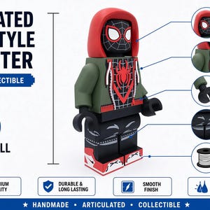 May include: An articulated block-style character figure standing 16 inches tall. The figure features a red hood, a green jacket with a red spider emblem, black arms, and black legs with red and white shoes. Text includes ARTICULATED BLOCK-STYLE CHARACTER.