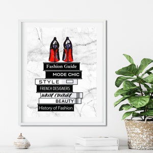 May include: A white and gray marble background with a stack of books with black and white text. The books are titled "Fashion Guide", "Mode Chic", "Style", "French Designers", "Haute Couture", "Beauty", and "History of Fashion". Two black high-heeled shoes with red soles are on top of the books.