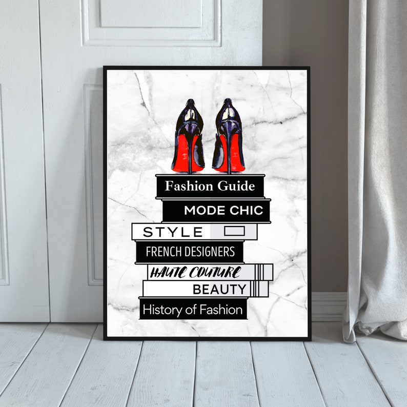 May include: A black and white illustration of a pair of red high heels on a stack of books. The books have titles related to fashion, including "Fashion Guide", "Mode Chic", "Style", "French Designers", "Haute Couture", "Beauty", and "History of Fashion".