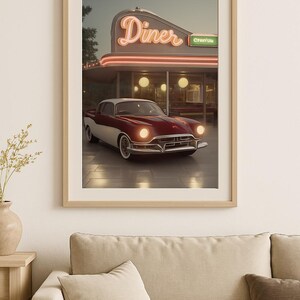 May include: A vintage red and white car parked in front of a retro diner with a neon sign that reads "Diner" and a green sign that reads "Creamy".