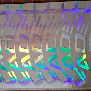 Le jeu de décalcomanies personnalisées est compatible avec le CADEX 50 DISC. Chrome arc-en-ciel, noir, or, argent. Pour freins à disque.