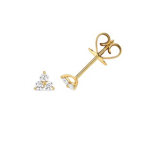 May include: A pair of gold stud earrings featuring a cluster of three clear gemstones. The earrings have a post and butterfly clasp. The design is simple and elegant, suitable for everyday wear or special occasions.