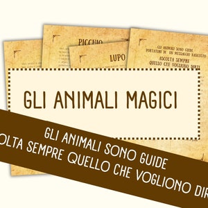 Può includere: Un'illustrazione in stile vintage con il testo "GLI ANIMALI MAGICI" in marrone su sfondo crema. Il testo "GLI ANIMALI SONO GUIDE" è in marrone su sfondo marrone. Il testo "ASCOLTA SEMPRE QUELLO CHE VOGLIONO DIRTI" è in marrone su sfondo marrone.