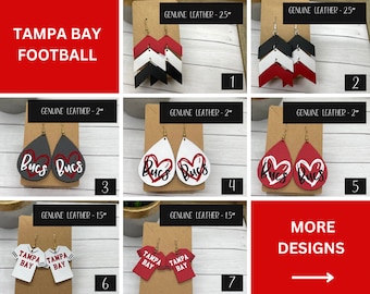 May include: Seven different styles of leather earrings featuring the Tampa Bay Buccaneers logo. The earrings are available in various sizes, including 2 inches, 2.5 inches, and 1.5 inches. The earrings are made of genuine leather and feature a variety of designs, including arrows, teardrops, and t-shirts.