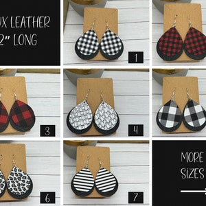 May include: Seven pairs of faux leather earrings in various patterns, including black and white checkered, red and black checkered, silver, leopard print, and stripes. Each pair is 2 inches long.  Faux Leather 2" Long.