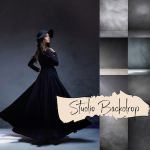 May include: A woman wearing a black dress and a black hat stands in front of a gray backdrop. The text "Studio Backdrop" is written in black on a beige background.