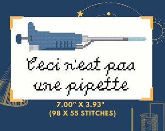 May include: A cross-stitch pattern featuring a pipette with the text "Ceci n'est pas une pipette" in black. The pattern is 7.00 inches by 3.93 inches and has 98 by 55 stitches.