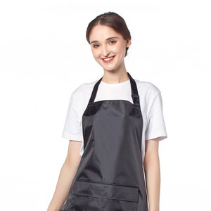 black-waterproof-soft-pvc-apron-with-adjustable-neck-strap-and-front