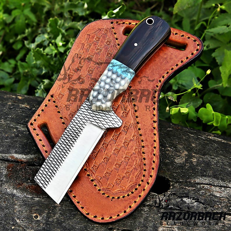 Farrier Rasp Cowboy Knife WIth Wenge wood handle, the knife has a combination of honey comb, tiffany blue and wenge wood handle. the sheath well crafted western cowboy style pancake sheath with a weave pattern on it