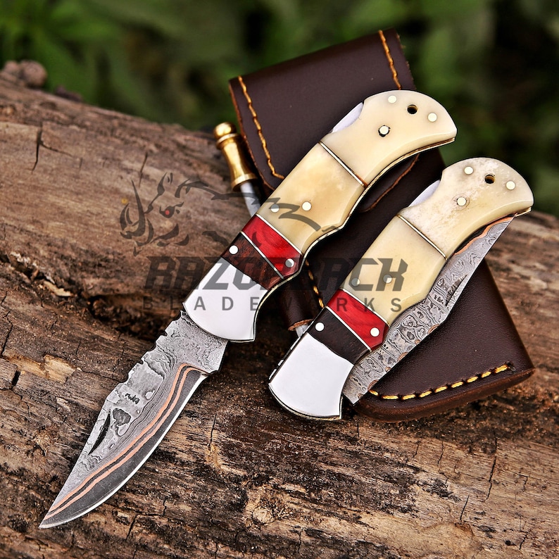 personalized pocket knife with bone handle and copper damascus blade which comes with leather sheath, you can customize  it for gifting to groomsmen