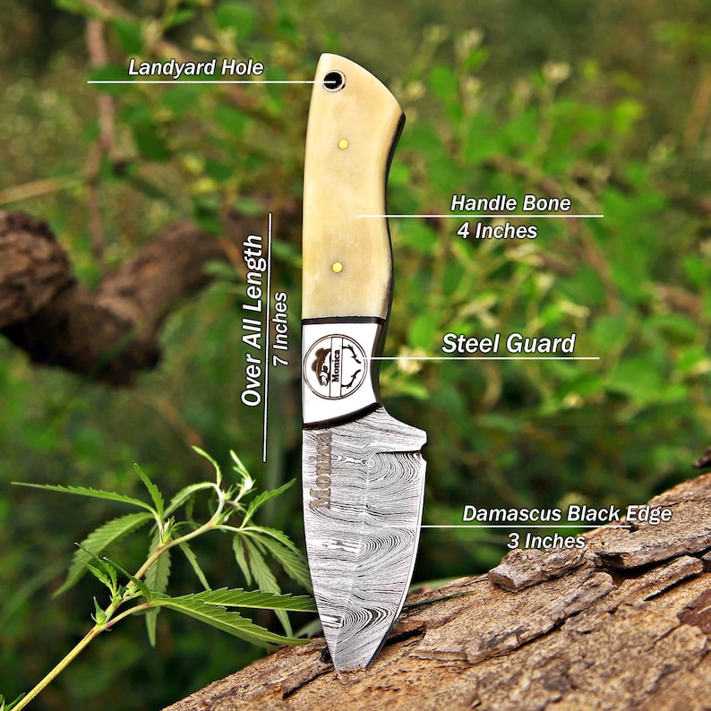 May include: A fixed-blade knife with a 3-inch Damascus steel blade and a 4-inch bone handle. The knife features a steel guard, a lanyard hole, and a total length of 7 inches. The blade and guard are marked with the text Monica.