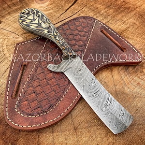 Damascus bull cutter knife with pancake sheath, the handle has forging marks on the handle, the knife is 8" overall which makes it easier to carry for the cowboys. this one is a perfect outdoor knife for cowboys