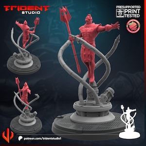 Puede incluir: Una figura roja impresa en 3D de un personaje humanoide sosteniendo un tridente, con un diseño detallado. La figura está montada sobre una base circular gris con un diseño mecánico complejo. El logotipo de Trident Studio es visible.