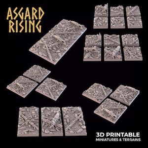 May include: A selection of 3D-printed miniatures and terrains. The image shows several square and rectangular terrain pieces with a detailed, textured surface. The text "Asgard Rising" is in the upper left, and "3D Printable Miniatures & Terrains" is in the lower right.