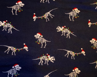 Christmas Dinosaur Skeletons 100% cotton flannel fabric 18” x 21” fat quarter