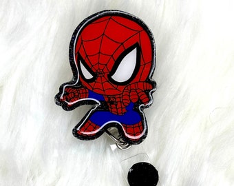 Interchangeable or permanent glitter spiderman badge reel