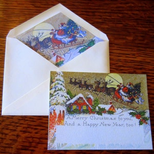 May include: A vintage Christmas card with a gold background featuring Santa Claus in a sleigh pulled by reindeer flying through the night sky. The card has a message that reads "A Merry Christmas to you, And a Happy New Year, too!"