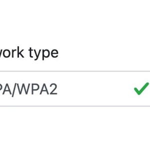 A screenshot of a Wi-Fi settings page with fields for "Network name," "Network type," and "Password"; "SSID" is entered in the network name field, and "WPA/WPA2" is selected for network type.
