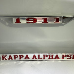 1911- Kappa Alpha Psi License Frame Silver Background Red Letters