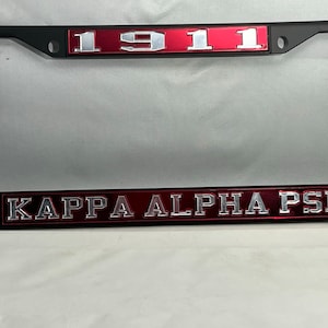 1911 Kappa Alpha Psi Black License Frame- Red Background Mirror Letters