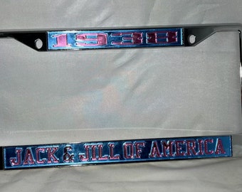 Marco de matrícula de Jack & Jill of America de 1938: fondo azul cielo y letras rosas