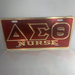 Delta Sigma Theta- Nurse License Plate Red Background Gold Outline & Rim LICENSE PLATE