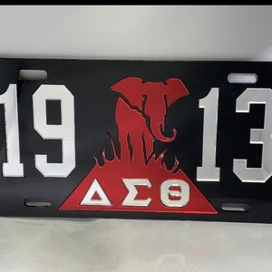 1913 Delta Sigma Theta- License Plate w/ Red Elephant Black Background Mirror Letters Red Elephant TAG