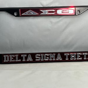 DST Delta Sigma Theta Black License Frame- Red Background Mirror Letters