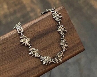 Pulseira Marching Elephants em Prata de Lei com Marcassita ~ Serve em pulsos de até 19 cm