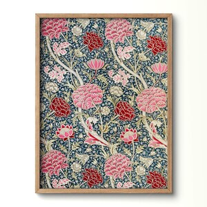 May include: A vintage floral print featuring pink, red and white flowers on a dark blue background. The print has a repeating pattern of stylised flowers and leaves.