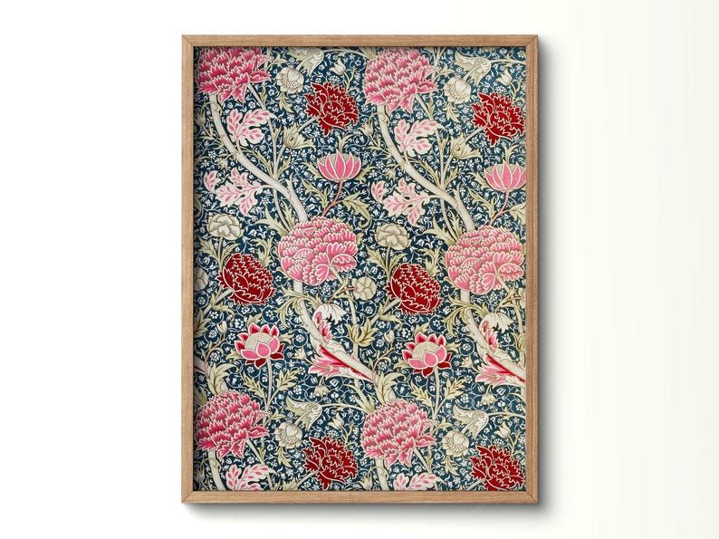 May include: A vintage floral print featuring pink, red and white flowers on a dark blue background. The print has a repeating pattern of stylised flowers and leaves.