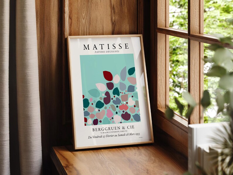 Henri Matisse Modern abstract art featuring a vibrant composition of soft, rounded shapes in shades of teal, coral, and deep burgundy, interspersed with muted pastels. The artwork exudes a playful yet sophisticated mood, with organic forms creating a sense of movement and flow across the canvas. Subtle textures and layered colors enhance the depth, inviting viewers to explore the interplay of light and shadow. Elegantly displayed on a living room wall, this printed poster wall art beautifully