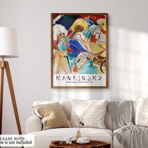 May include: Abstract art print featuring a colorful painting by Wassily Kandinsky titled "Improvisation 28 (Second Version)". The print is framed in a brown wood frame and includes the artist's name and title of the artwork.