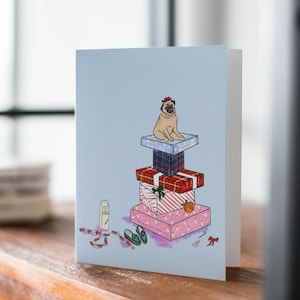 Tarjeta de felicitación navideña con diseño de Pug