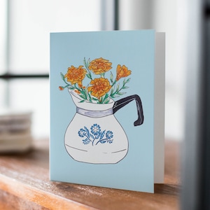 Tarjeta de felicitación vintage con motivo de aciano azul de Corningware