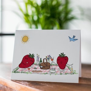 Cartão de aniversário com tema de piquenique de sapo morango