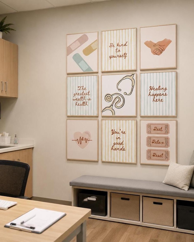 May include: A gallery wall of nine framed prints featuring medical and wellness themes. The prints include illustrations of bandages, a stethoscope, a heart rhythm, and tickets labeled Rest, Relax, and Reset, alongside text like Be kind to yourself.
